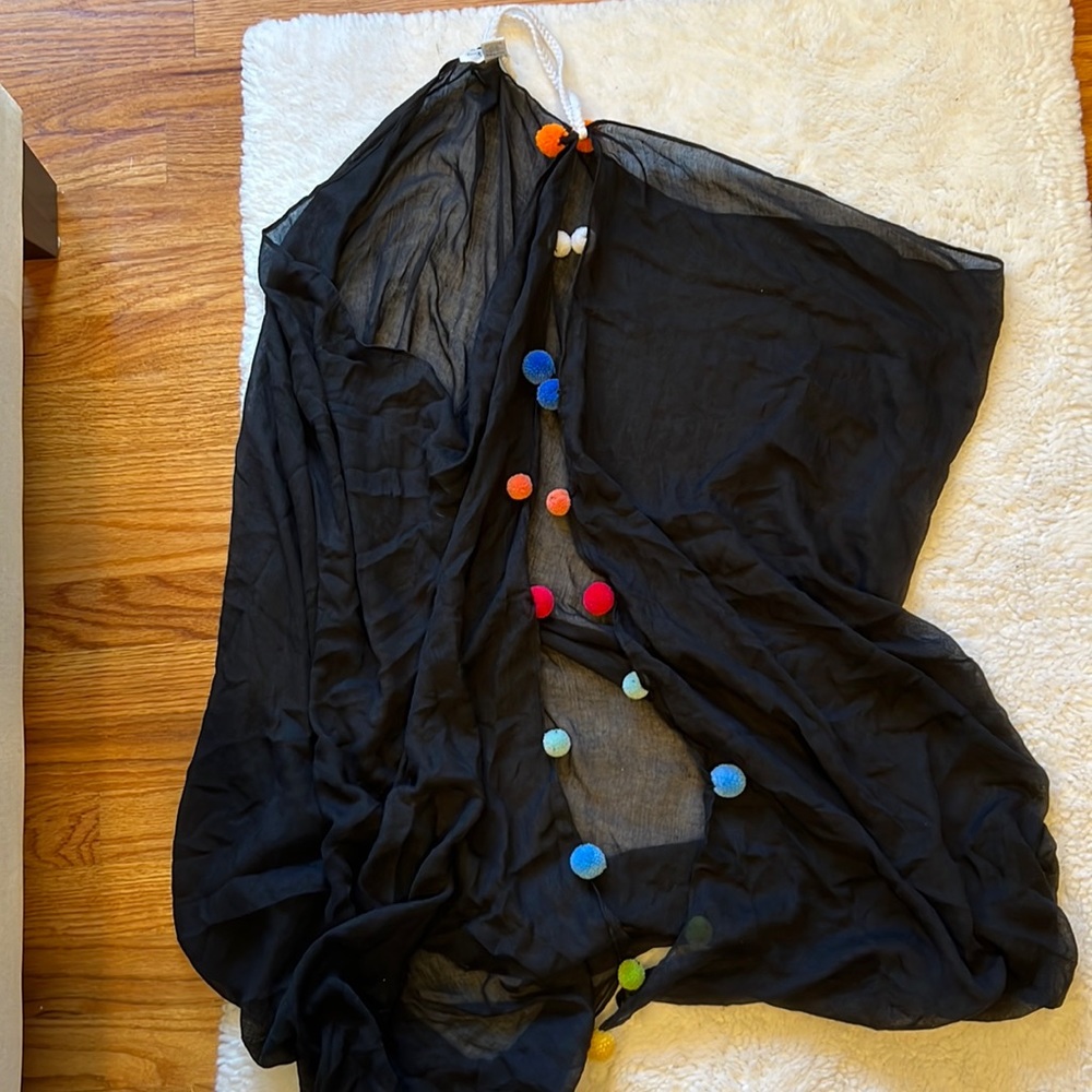 Black swim coverup with colorful Pom poms